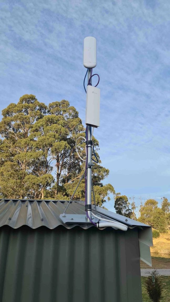 Network antenna installed on a rural shed roof
